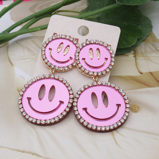 Smiley oorbellen roze